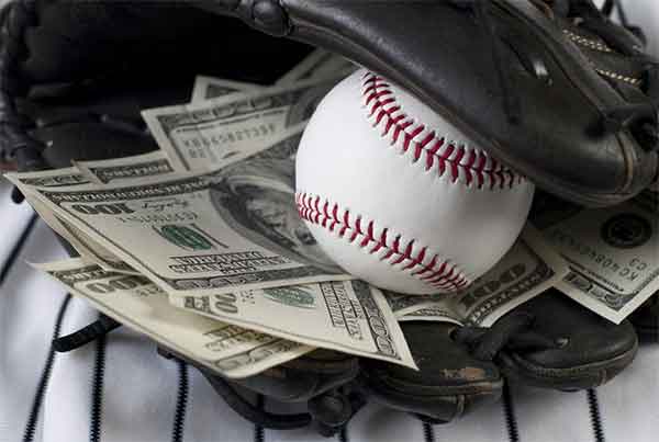money in a baseball glove
